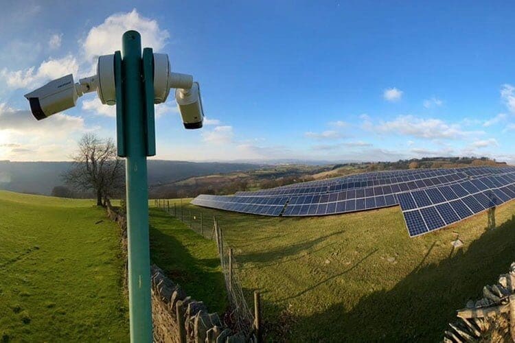 Security camera protecting a solar farm from theft and vandalism